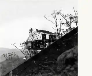 A small model of the dome photographed on the hillside lot
