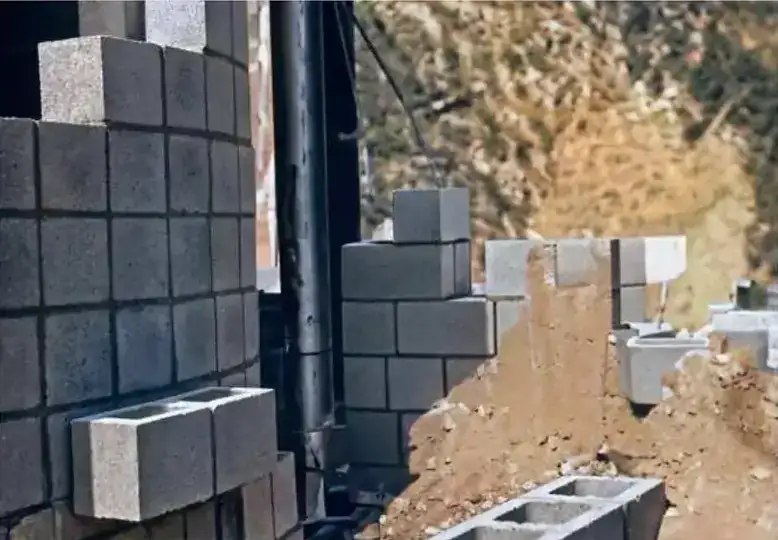 Concrete block stacked at the cut in the hillside